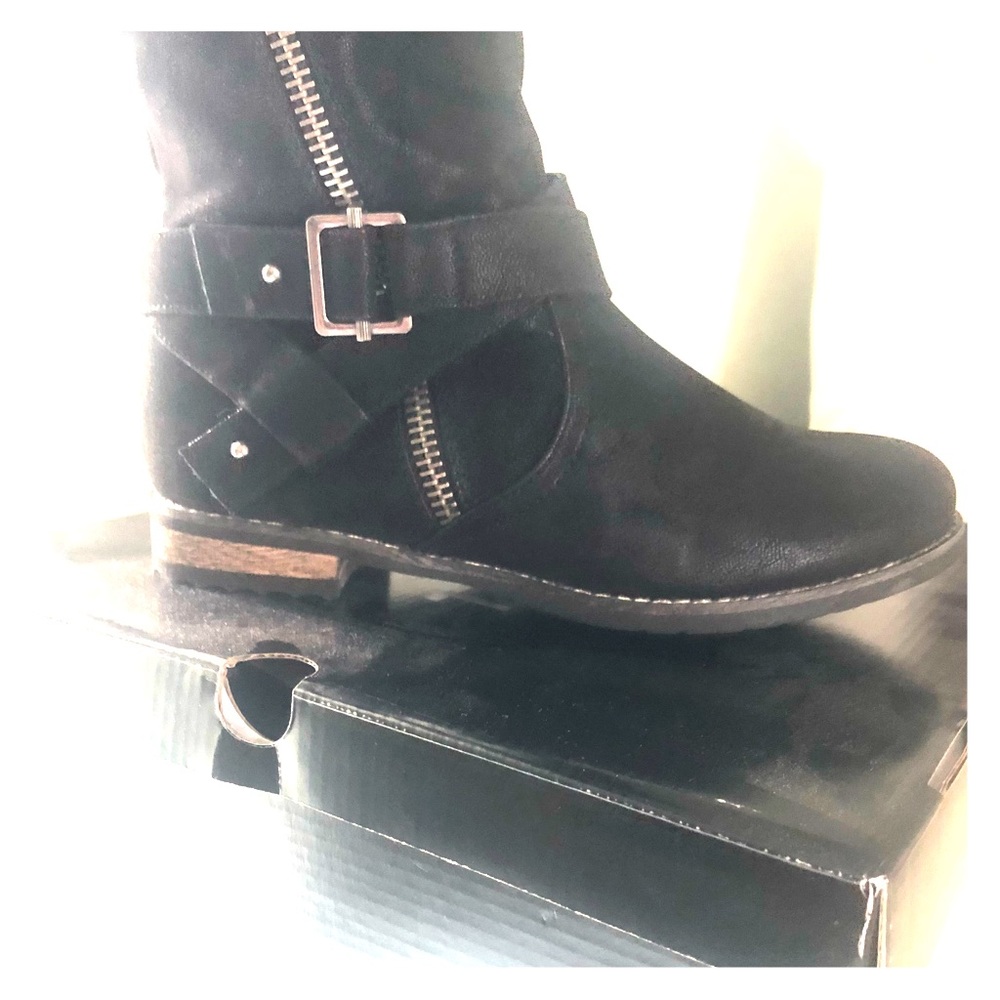 Brand new tall torrid boots.